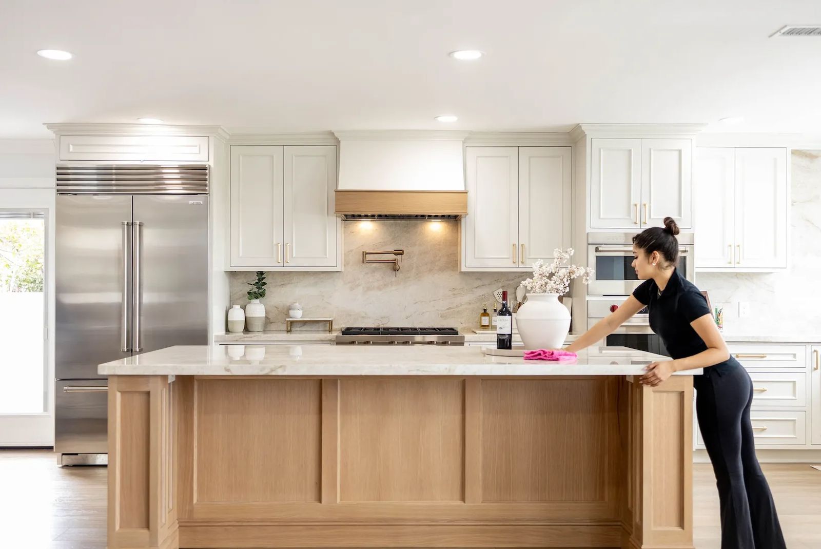 A Luminova cleaner detailing a kitchen island